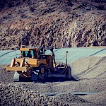 A bulldozer moves the preload on the heap leach pad at the Moss Mine.